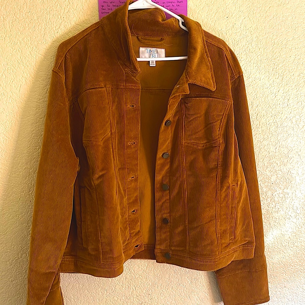 A gorgeous jean jacket with a soft velvet texture and vibrant color